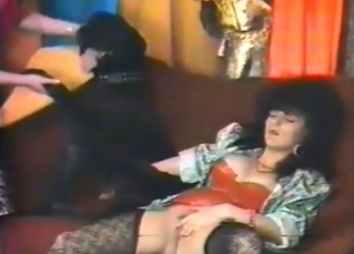 Black dog licks a juicy vagina