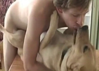 Blonde guy and a puppy