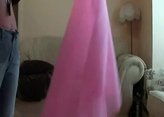 Girl drilled by dog on couch