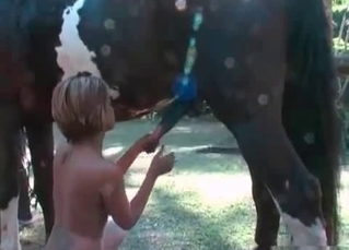 Lovely girl sucks her stallion