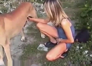 Blond-haired chick enjoys dog BJs