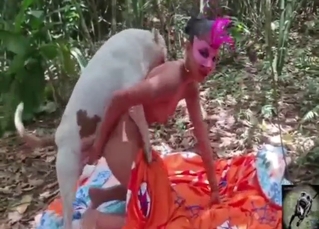 Bestiality porn shows a girl taking dog's dick