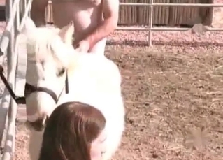 Redhead enjoys her doggy