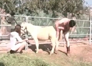 Redhead enjoys her doggy