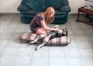 Spicy girl and her playful dog