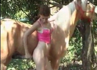 Busty model and horny horse